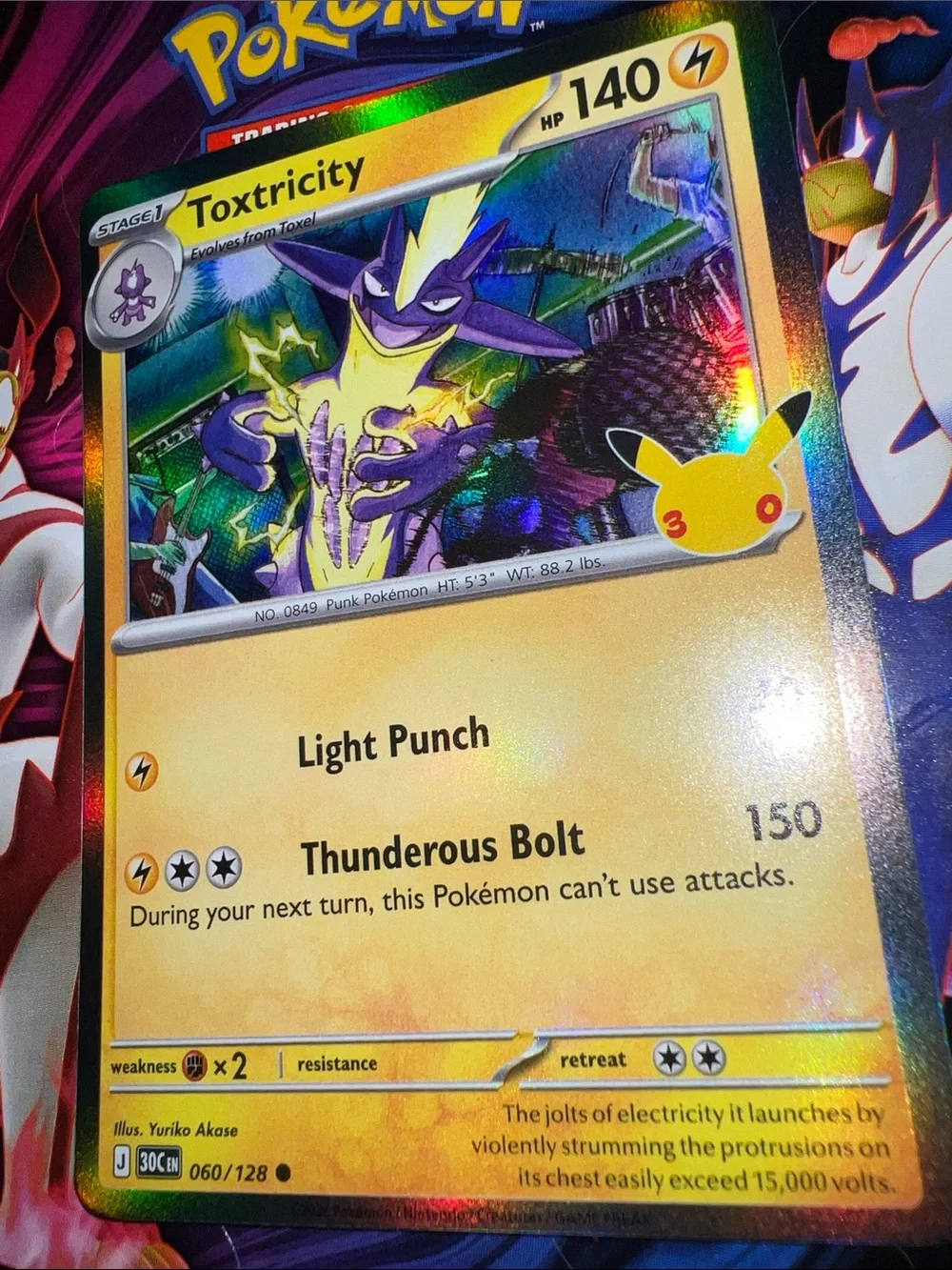 Pokemon Toxtricity Holographic Card - Yellow, Purple, Blue